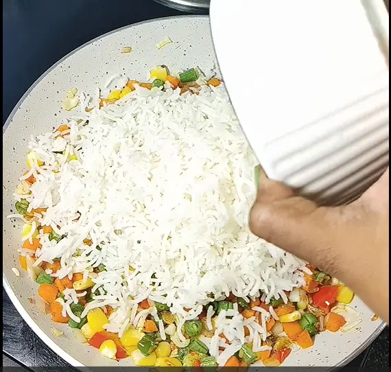 Mix well and add boiled rice to VEG FRIED RICE